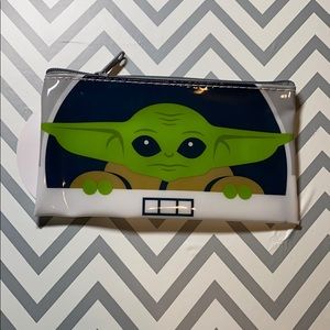 The Mandalorian Baby Yoda small makeup bag.